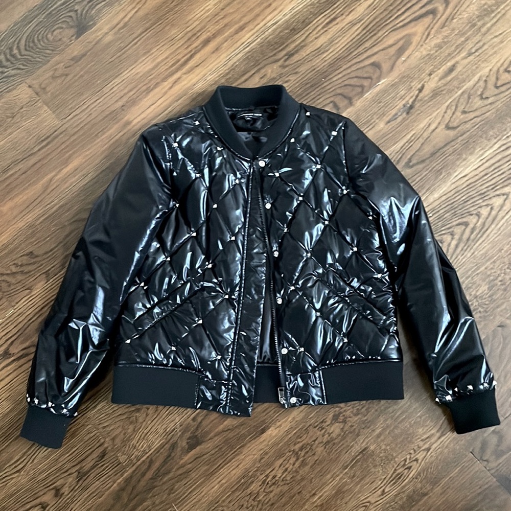 Generation Love quilted light puffer coat with silver grommets.